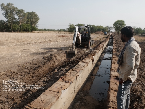 Bobcat Digger digging Drainage Channel May 2025