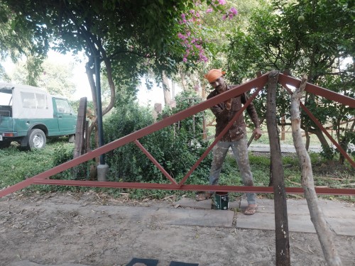 Narendra Painting Red Oxide on Truss Oct 2024